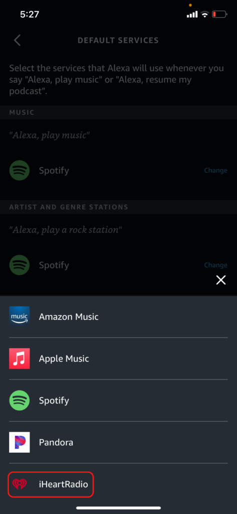 The Alexa app Default Services menu, showing how to select iHeartRadio in the pop-up 