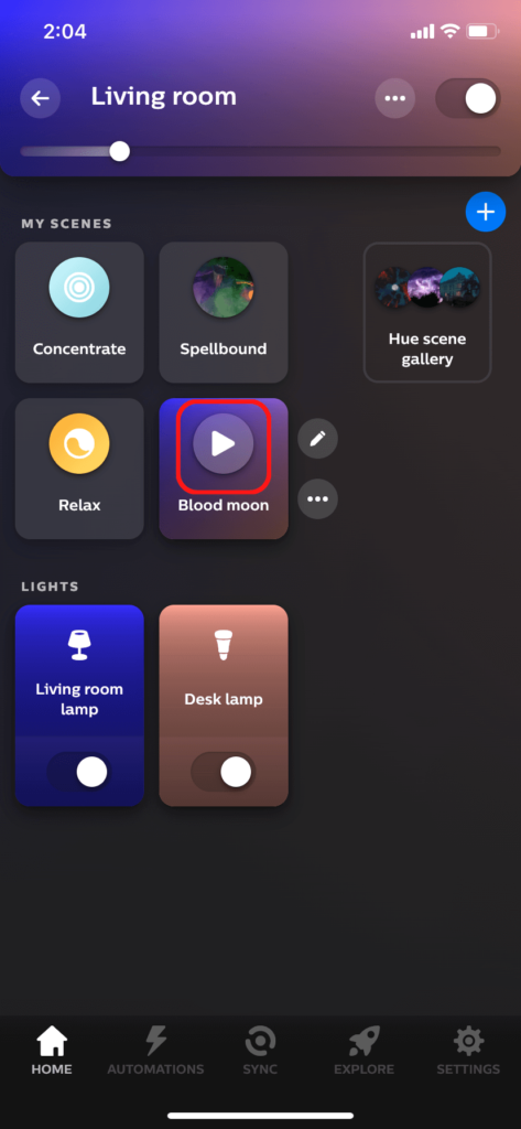 The room view in the Hue app, showing how to play a dynamic scene