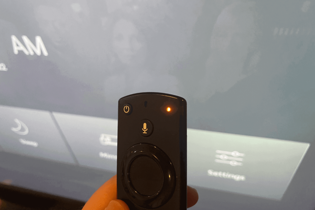 The blinking orange light on a Fire TV remote showing that it's in Discovery Mode