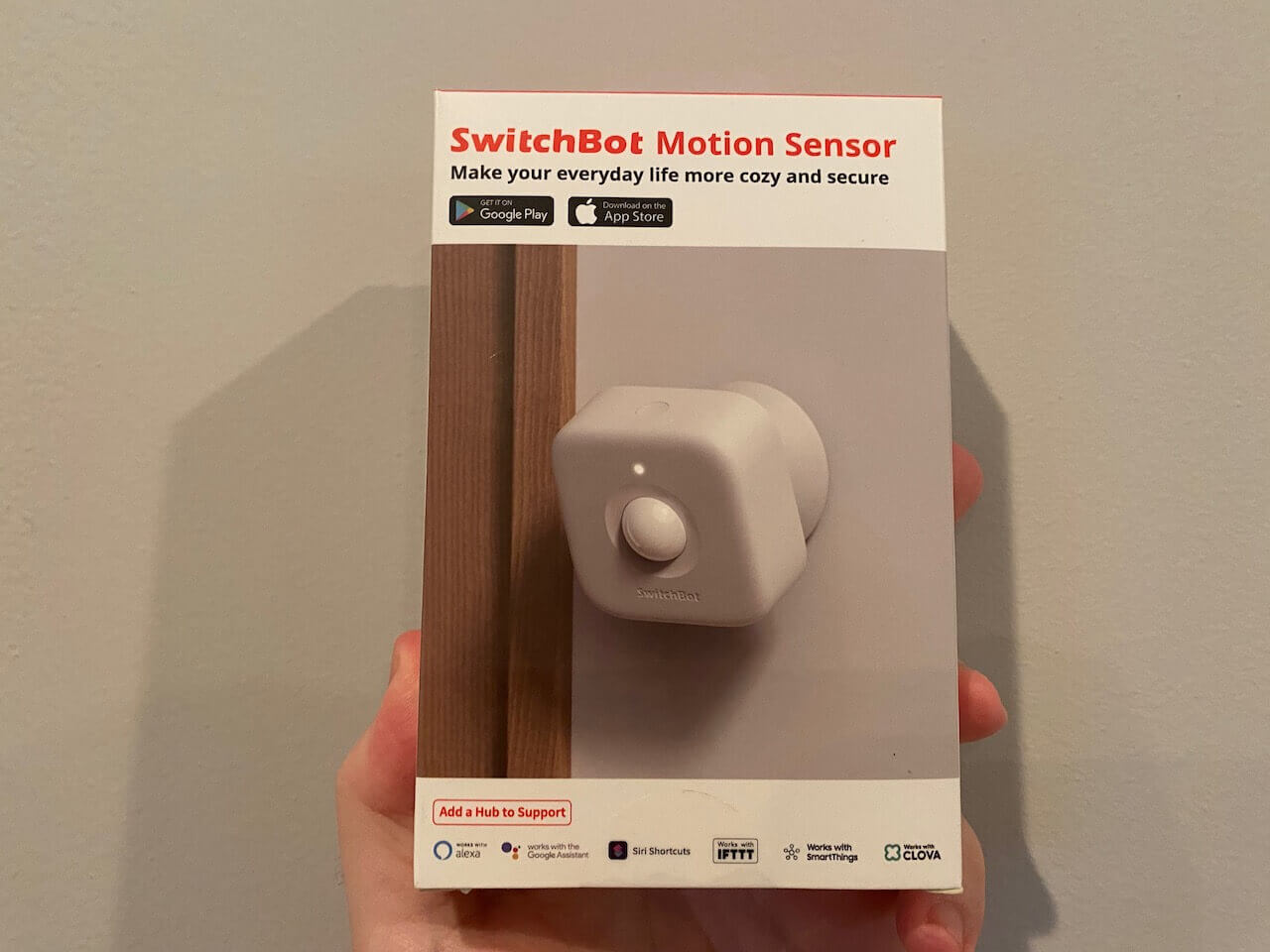 A smart motion sensor made by Switchbot, still in box